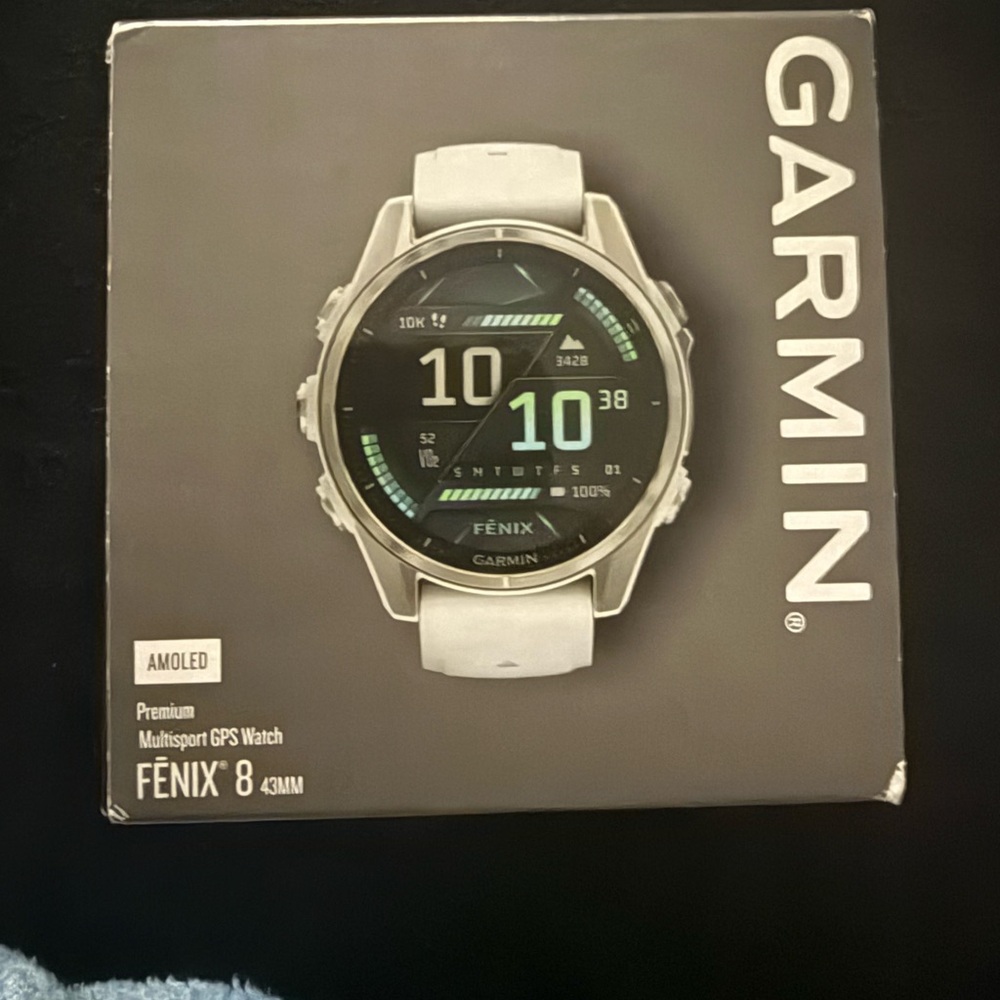 Garmin Fenix 8 GPS Watch with White Band and Silver Bezel